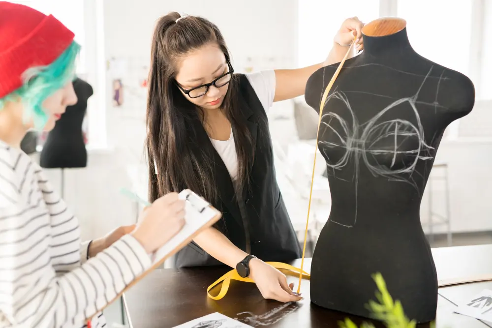 two-creative-young-women-working-atelier-Aprilluck
