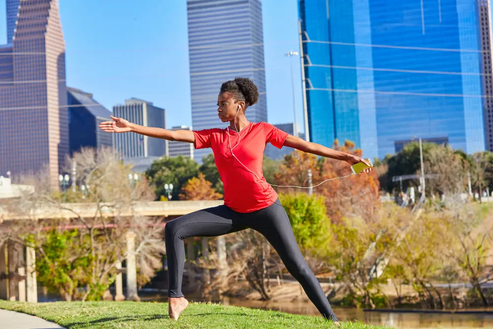 yoga-girl-stretching-listening-music-earphones.