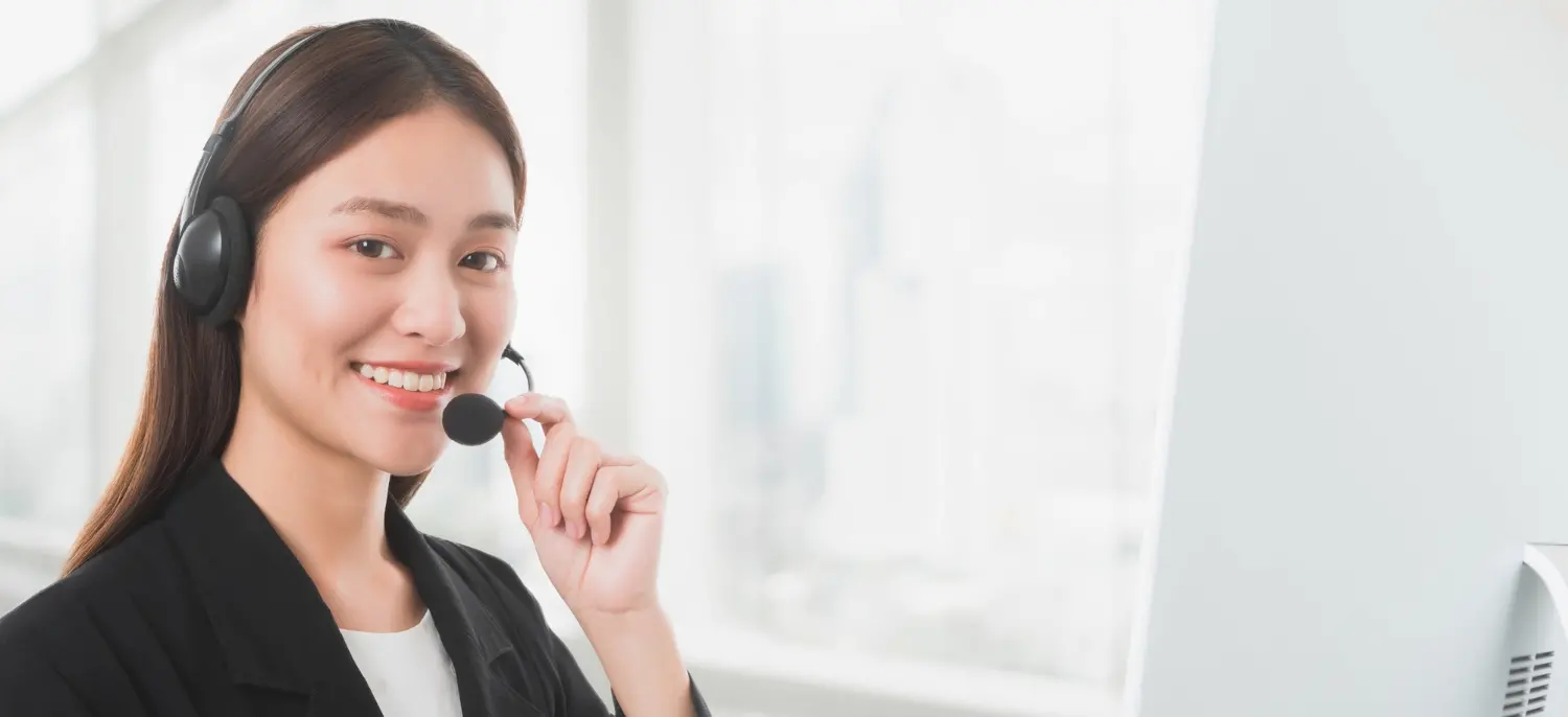 portrait-asian-beautiful-smiling-woman-customer-support-phone-operator-office.