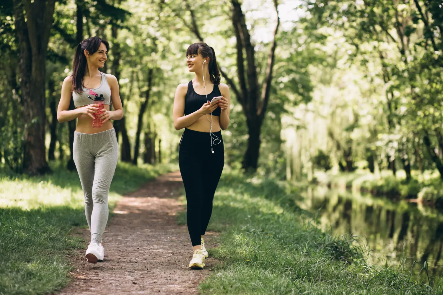 two-girls-jogging-park.