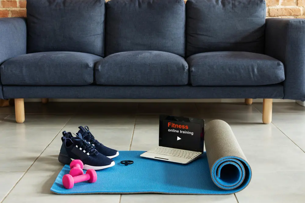 fitness-sports-equipment-laptop-home-living-room-background-home-online-workout-concept.